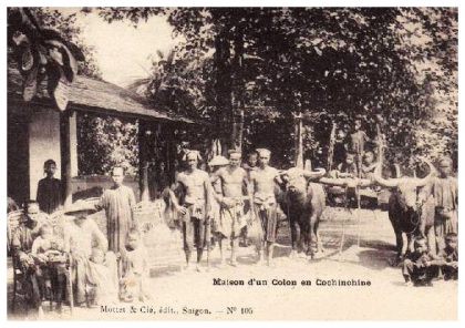 A French settler with his Vietnamese wife and servants in French Indochina, 1919